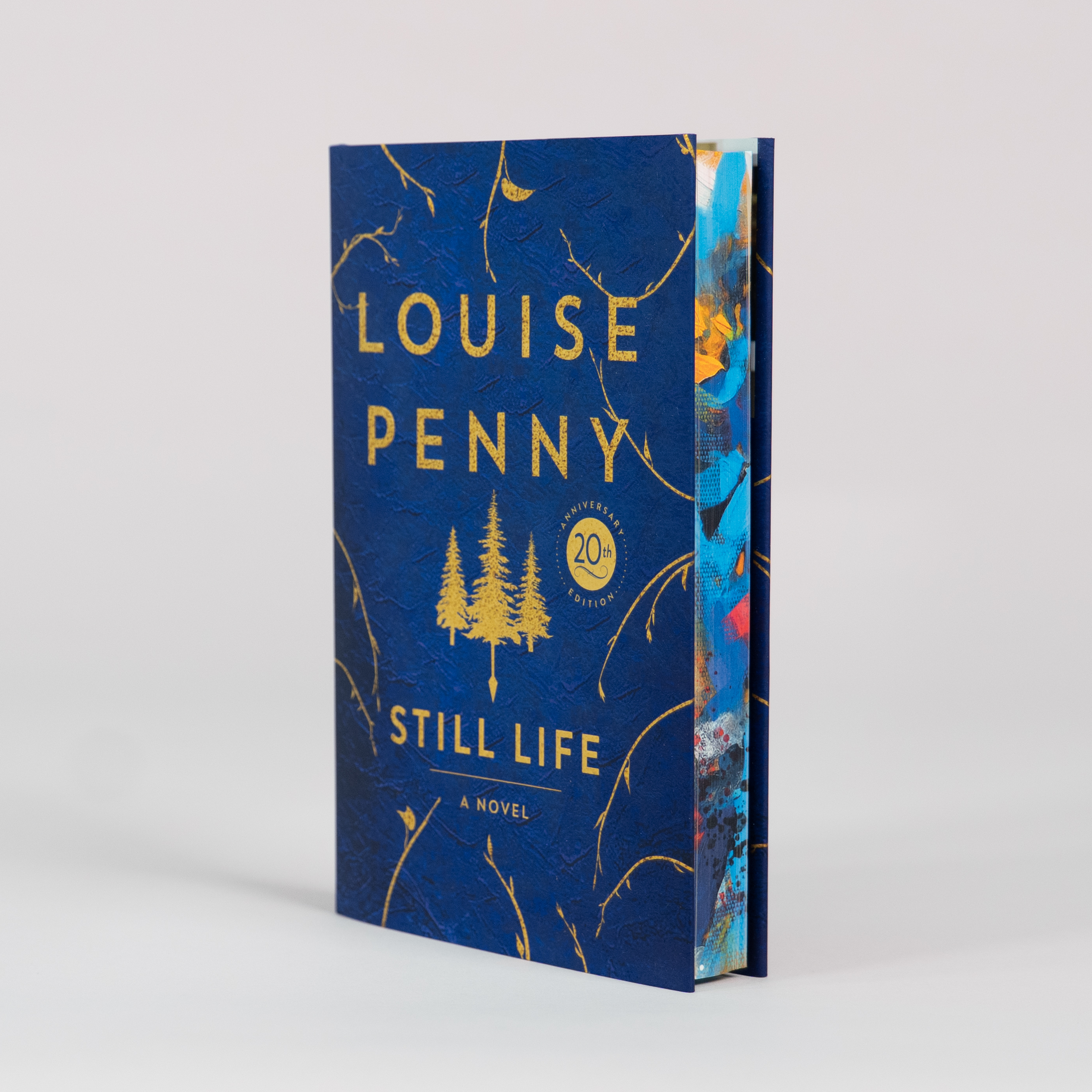 The edition stands at an angle, showing off stencilled edges.