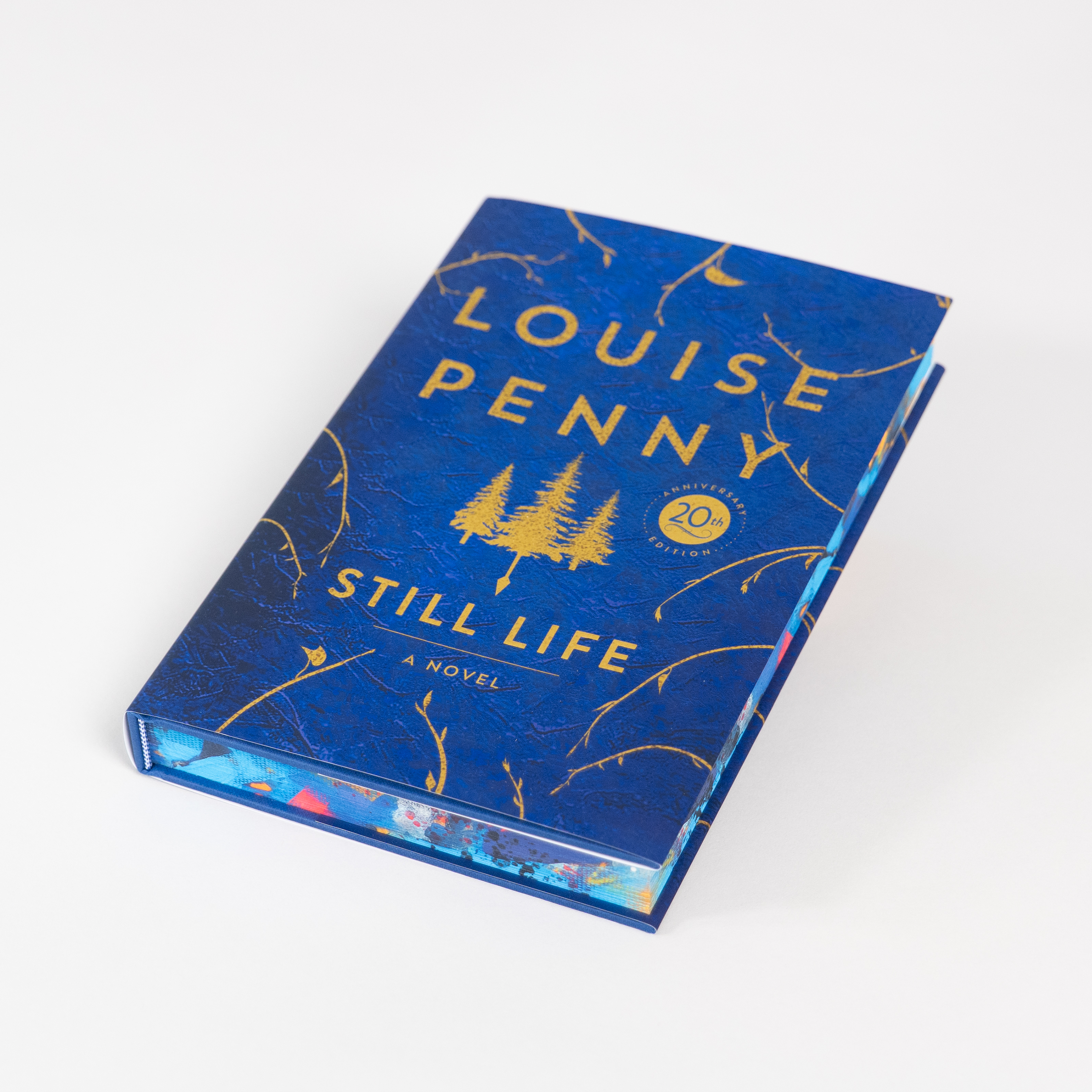 The edition lies flat, showing off stencilled edges.